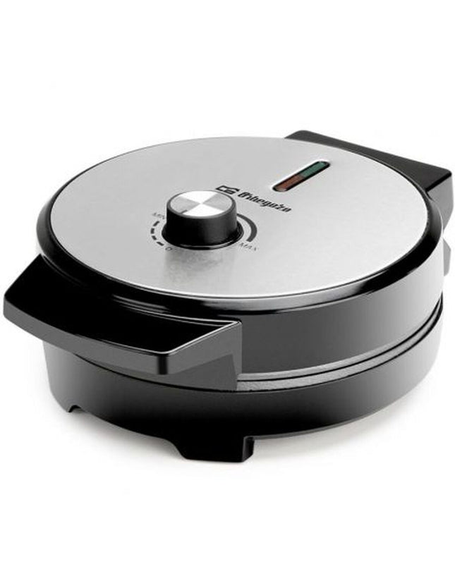 Orbegozo 18319 waffle maker with 1000W power, compact electric appliance for home cooking, featuring non-stick plates and easy operation.