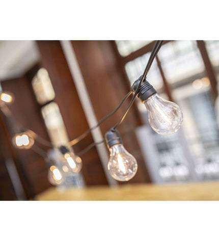 Outdoor black LED string light garland by New Garden, 8 meters long with 10 E27 bulbs emitting 350 lumens for garden decor.