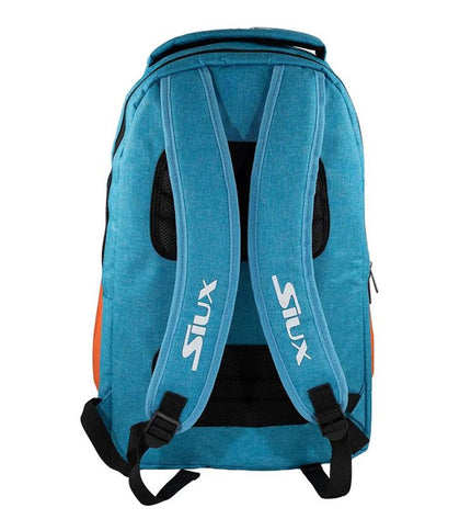 Orange Siux Pro Tour paddle tennis sport backpack with multiple compartments and padded shoulder straps.
