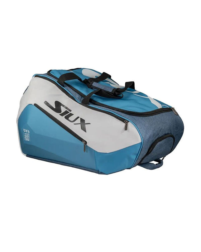 Blue Siux Pro Tour paddle tennis racket with ergonomic grip and sleek design for outdoor sports.