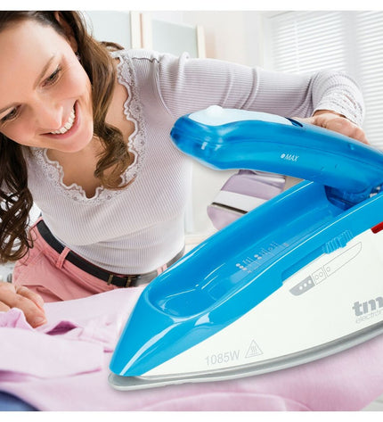 Blue TM Electron travel steam iron with 1085W power, compact design, suitable for home and travel ironing needs.