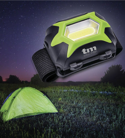 Green TM Electron 3W headlamp for outdoor activities, featuring adjustable strap and LED light for camping and hiking.