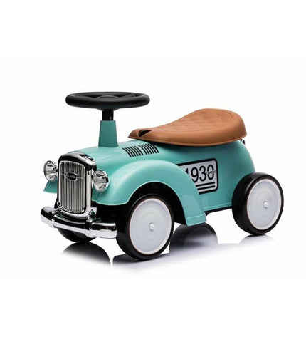 Green Devessport vintage tricycle toy for kids, suitable for outdoor play and sports activities, with a classic design.
