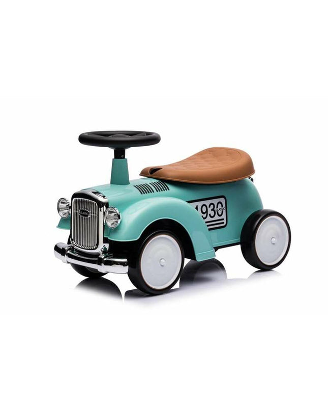 Green Devessport vintage tricycle toy for kids, suitable for outdoor play and sports activities, with a classic design.