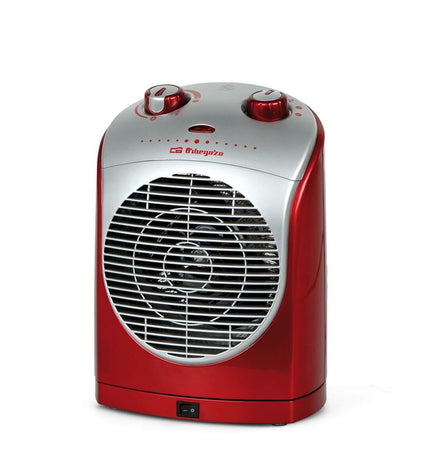 Orbegozo 16355 portable heater with 2200W power, suitable for home and kitchen heating, shown in a cozy indoor setting.