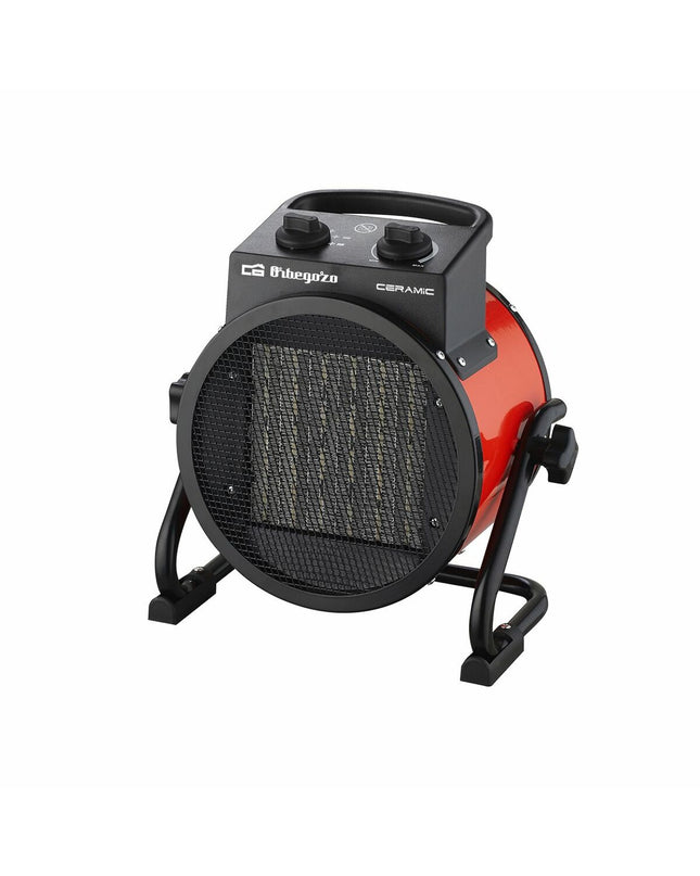 Black Orbegozo 17998 3000W space heater, portable heating device for home comfort, shown in a home setting