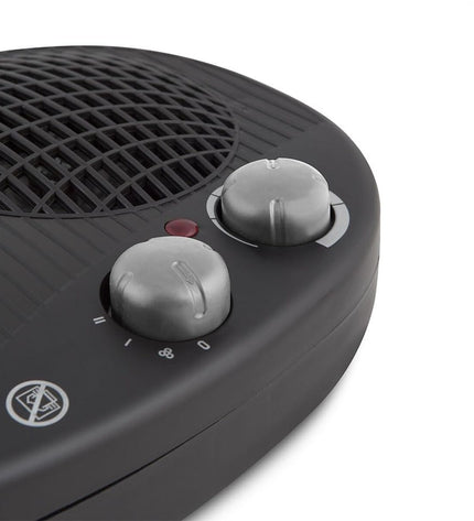 Black Orbegozo 16844 2000W portable heater for home and cooking, showcasing its compact design and control panel.