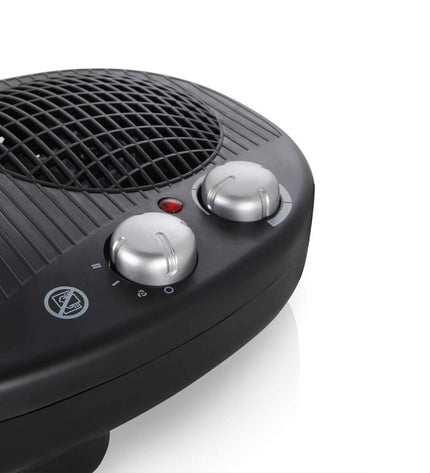 Black Orbegozo 16844 2000W portable heater for home use, showing compact design and control panel.