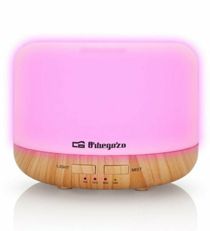 Orbegozo HUA-4000 portable air humidifier with 400 ml water tank, designed for home and kitchen use.