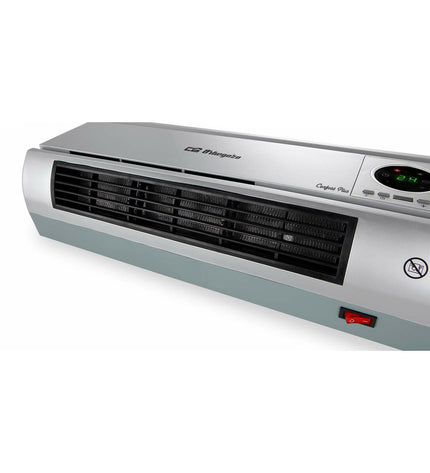 Orbegozo SP 6500 silver portable heater with 2000W for home and kitchen use, featuring adjustable temperature controls.
