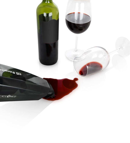 Orbegozo AP 1500 handheld vacuum cleaner for household cleaning, shown with attachments on a clean surface.