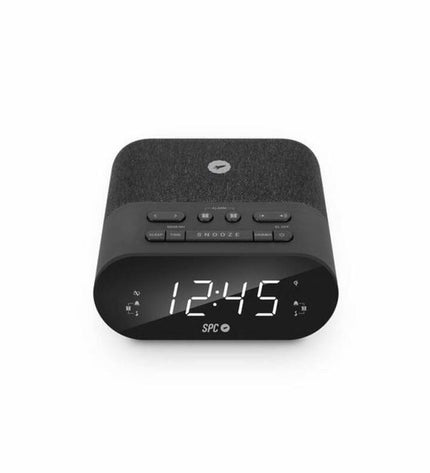 SPC alarm clock with wireless charger, digital display, and sleek black design, suitable for bedside or desk use.