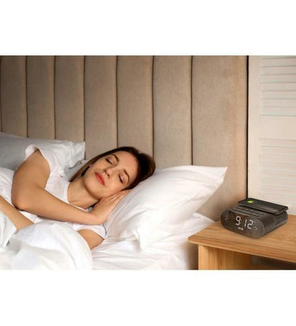 SPC alarmclock with wireless charger, digital display, and sleek design, ideal for bedroom or desk setup.