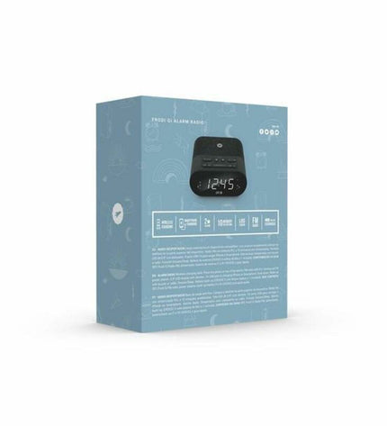 SPC alarm clock with wireless charger, digital display and modern electronic design, placed on a bedside table.