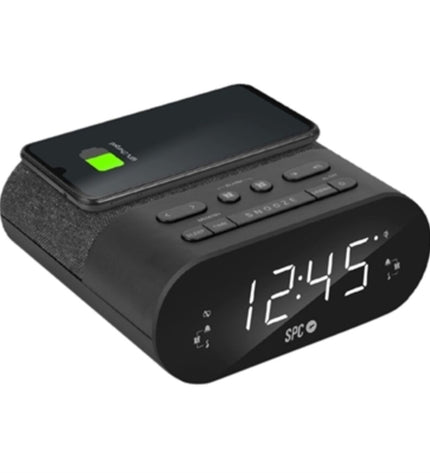SPC alarm clock with wireless charger, digital display, and sleek design, suitable for bedroom or office use.