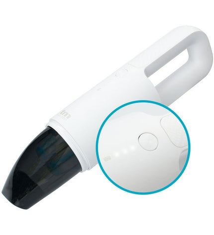 TM Electron Kruimelzuiger for home cleaning, compact handheld vacuum with ergonomic grip and dust container in action.