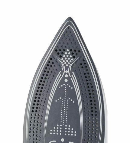 Fagor Comforta steam iron with 32x13.5x15.7 cm size and 3000W power, shown on a ironing board for household clothing care.