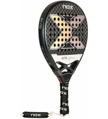 Nox Sport AT10 Luxury Genius 12K paddle tennis racket with sleek design, suitable for outdoor padel matches, endorsed by Agustín Tapia.