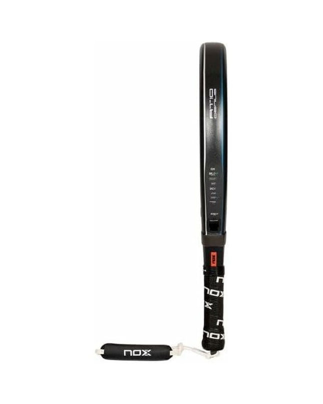 Nox Sport AT10 Luxury Genius 12K paddle tennis racket with sleek design, used outdoors for padel tennis, inspired by Agustín Tapia