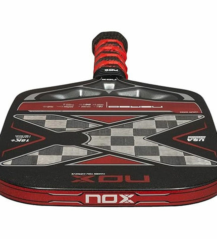 Nox Nerbo black pickleball paddle with carbon fiber surface for paddle tennis, outdoor sports, Nox Sport brand.