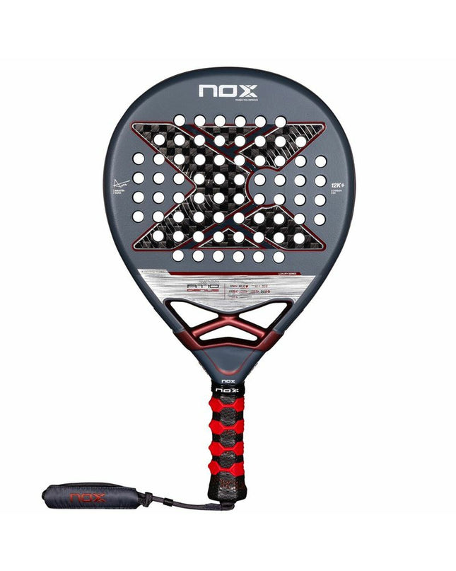 Nox-Xtreme AT10 Genius Padel Racket with 12K carbon fiber, designed for paddle tennis, featuring a sleek black and blue grip.