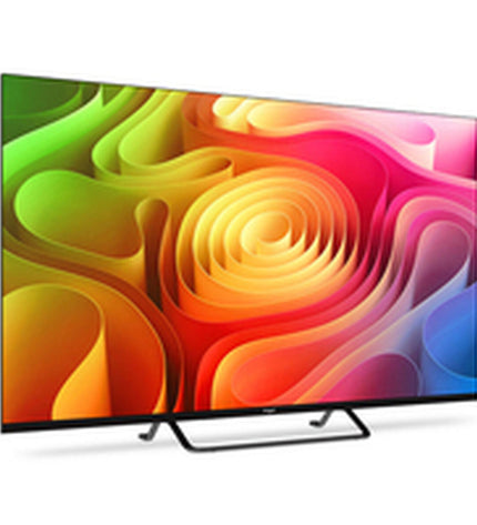 Engel LE4395QLED 43-inch 4K Ultra HD smart TV with slim black frame, display showing vibrant colorful images.