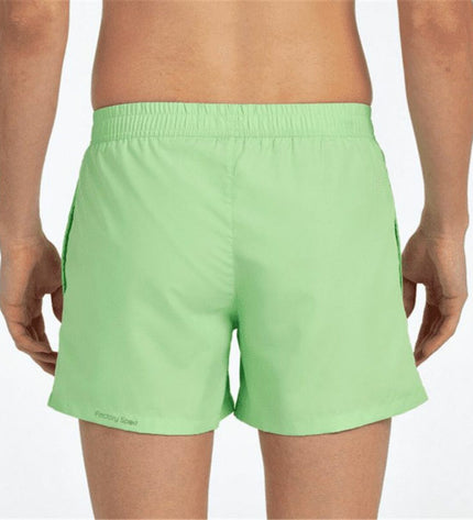 Green men's swim shorts by John Smith for sport and watersport, featuring a comfortable fit and quick-dry fabric.