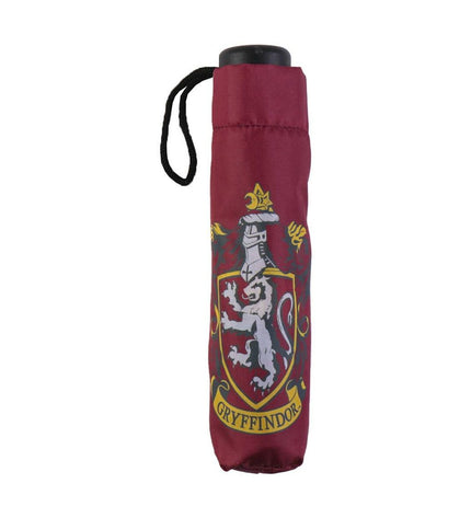 Foldable Harry Potter Gryffindor umbrella with red and gold design, compact luggage umbrella for fans of the Harry Potter series.