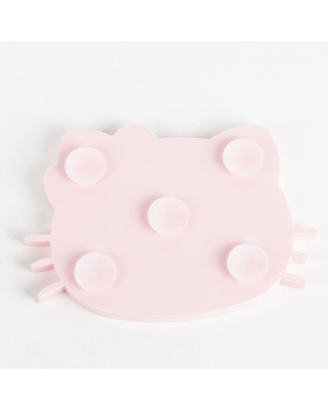 Pink Hello Kitty dog bed with plush fabric and embroidered character, perfect for small dogs and fans of Hello Kitty.