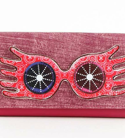 Fuchsia Harry Potter wallet with cardholder from Harry Potter luggage collection, featuring magical design details.