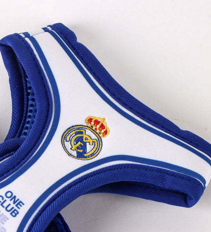 Blue Real Madrid C.F. dog harness featuring team logo, made for comfort and style for fans' pets.