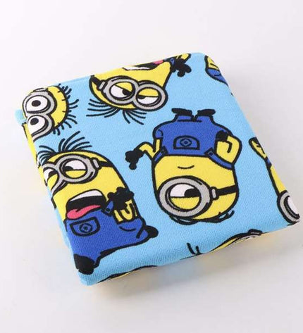Minions hooded poncho towel for kids, 55 x 77 cm, soft and absorbent, featuring Minions characters for bath or pool use.