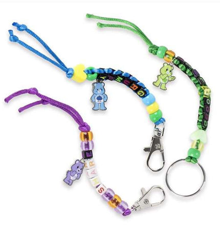 Care Bears DIY bracelet making kit featuring colorful beads and charms, ideal for creative activities and playful jewelry crafting.