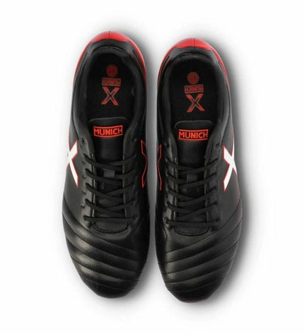 Adult Munich Arenga 310 soccer cleats for outdoor football, showing black and red design with studded sole for grip.