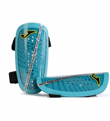 Joma Sport Attack turquoise football shin guards for sports and outdoor soccer, with protective padding and adjustable straps