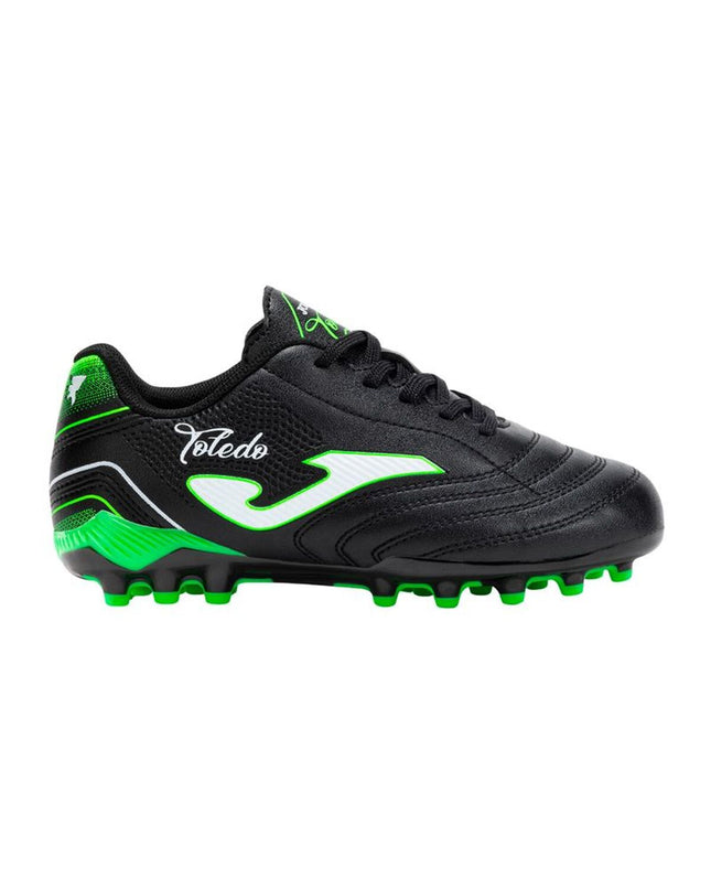 Black Joma Sport Toledo adult football shoes for outdoor soccer, featuring sporty design and durable construction.