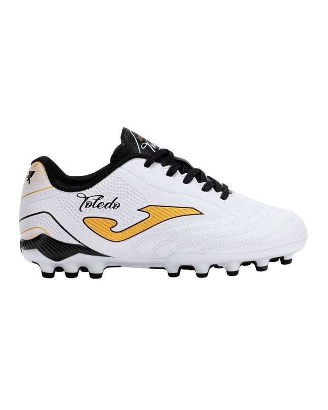 White Joma Sport Toledo 2502 adult football cleats for outdoor soccer, featuring durable design and sporty style.