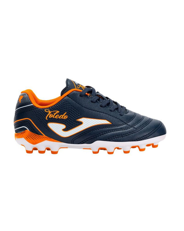 Blue Joma Sport Toledo adult football cleats for outdoor soccer, featuring sporty design and durable studded sole.