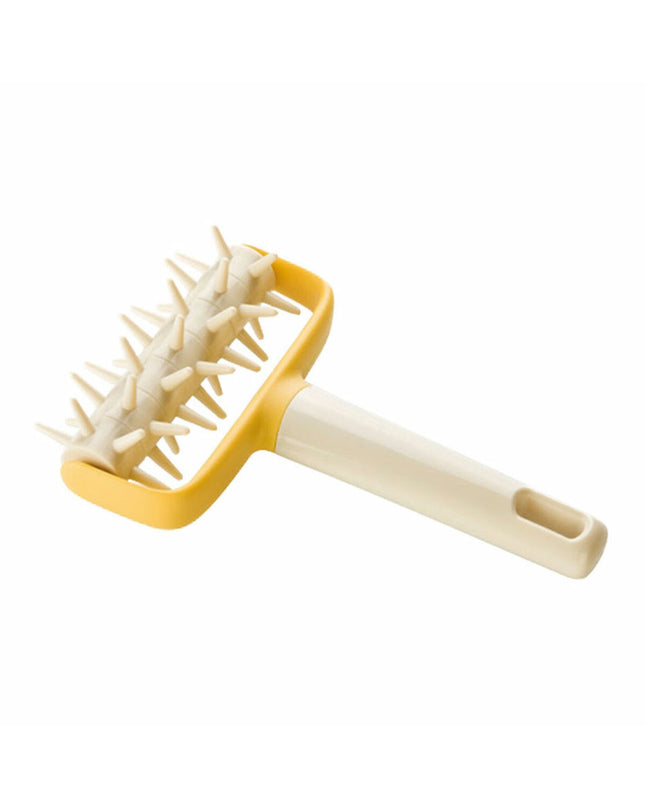 Tescoma Delicia plastic deegroller with shape molds for baking and cooking, ideal for creating decorative dough patterns.