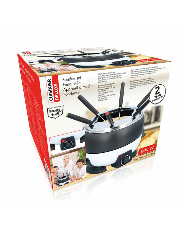 Cuisinier Deluxe Fondue Cuisinier Deluxe set with stainless steel pot and utensils for home cooking and entertaining.