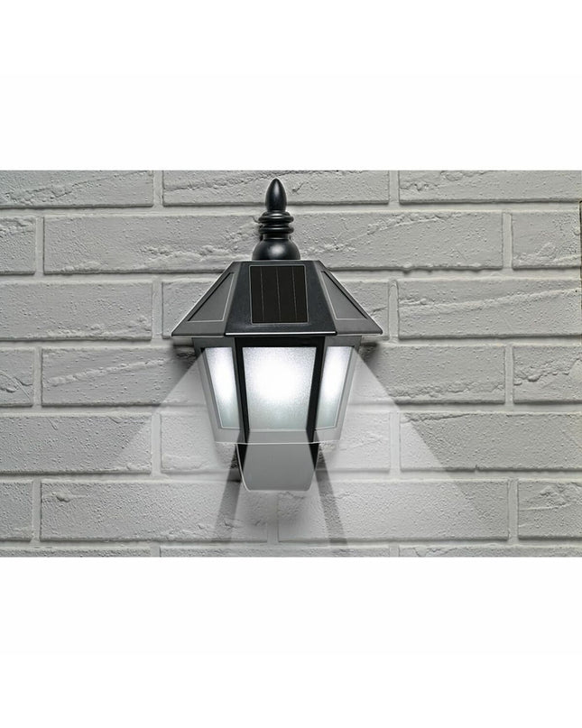 Grundig black plastic outdoor garden wall lamp, decorative lighting fixture for outdoor spaces.
