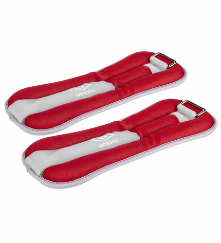 Pair of 1 kg red Umbro Enkelgewichten for fitness and outdoor workouts, featuring durable design for strength training.
