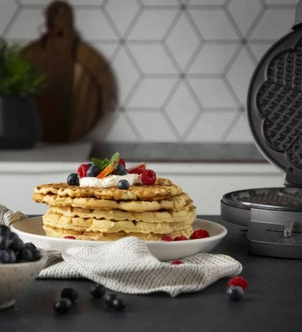 Princess waffle maker 132380 in black and silver, 1200W electric kitchen appliance with stainless steel finish.