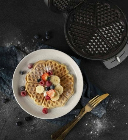 Princess Wafelmaker 132380 in black and silver with 1200W power, compact electric waffle maker for home cooking.