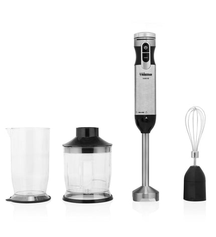 Tristar MX4829 black and silver hand blender with 1000W power, shown with blending attachments on a kitchen countertop.
