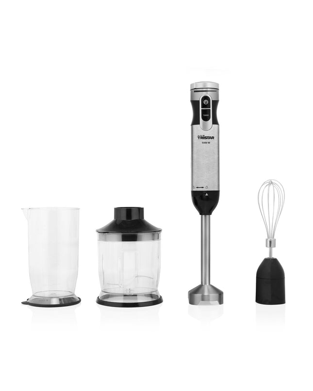 Tristar MX4829 black and silver hand blender with 1000W power, shown with blending attachments on a kitchen countertop.