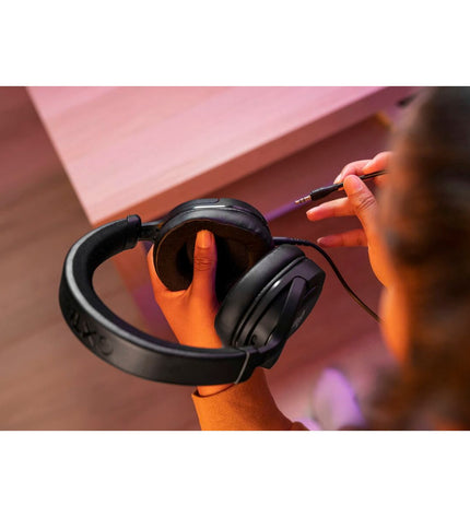 Trust 24715 gaming headset with microphone, black over-ear headphones for consoles and electronic gaming setups.