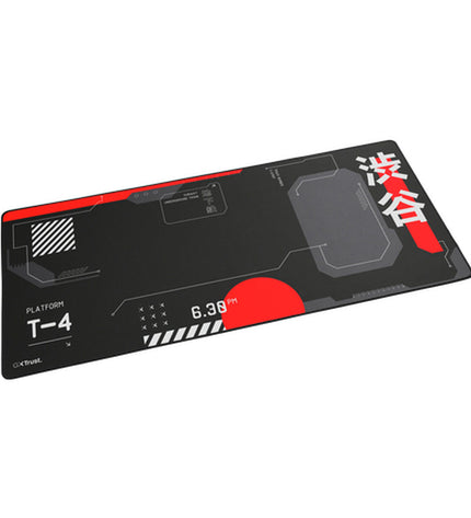 Trust gaming mat in black with textured surface, designed for plug-and-play game consoles and electronic gaming setups.