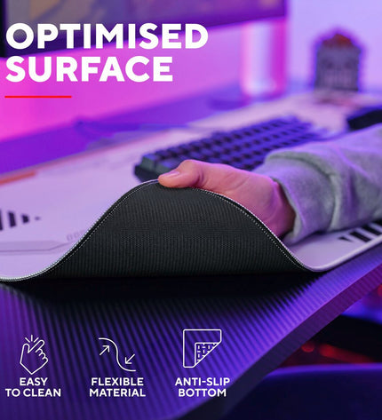 Trust gaming mat for plug-and-play game consoles, with a sleek surface suitable for electronic gaming setups.