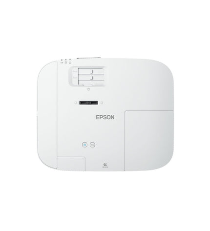 Epson V11HA73040 projector displaying a home theater scene on a wall in a modern living room setup